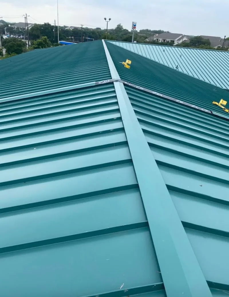 Green commercial metal roof ridge and valley for Metal Roof Repair in Coweta
