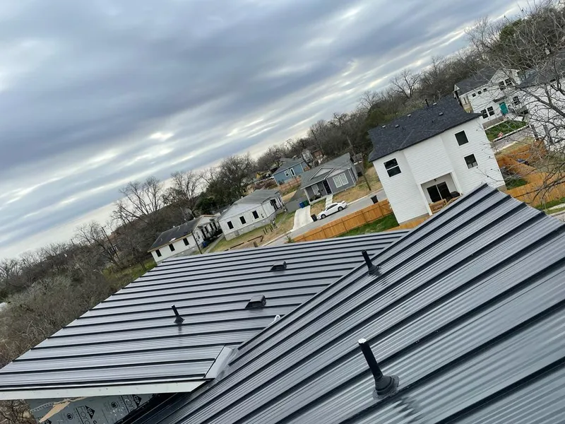 Standing seam metal roof panels with vents for Skylight Repair in Coweta